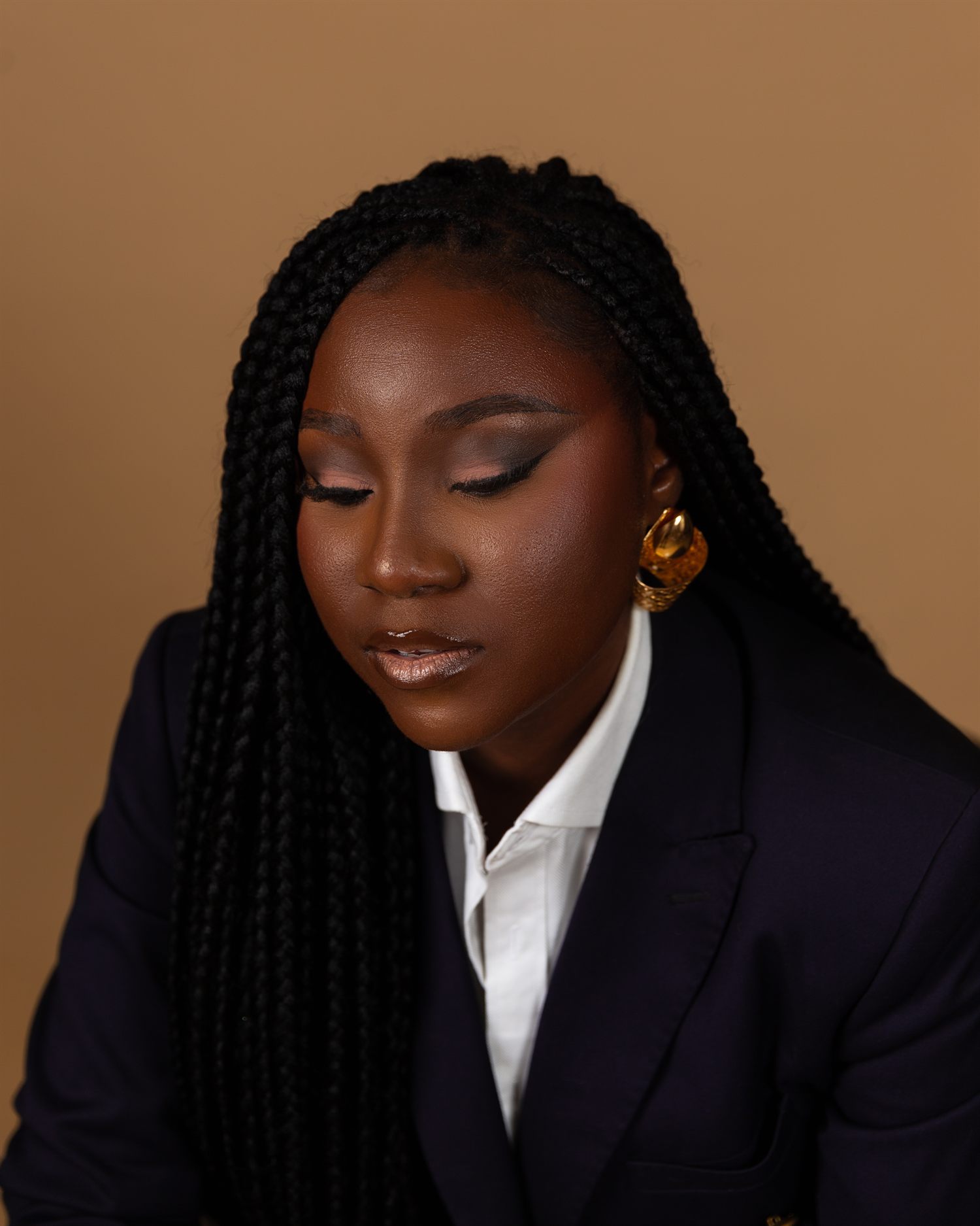 Lauren Henry, pattern making and garment construction coach, in a navy blazer